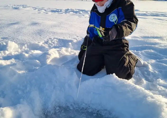 Estadia em família na Lapónia finlandesa - Raquetes & pesca no gelo - Foto do dia