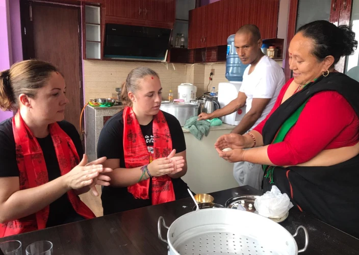 Faces of Nepal - Making Yomari with local hosts - Yomari