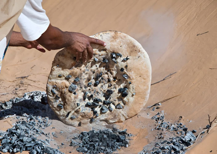 Une nuit sous les étoiles à dos de dromadaire. - Départ vers le désert à dos de dromadaire. - Dégustation du pain de sable